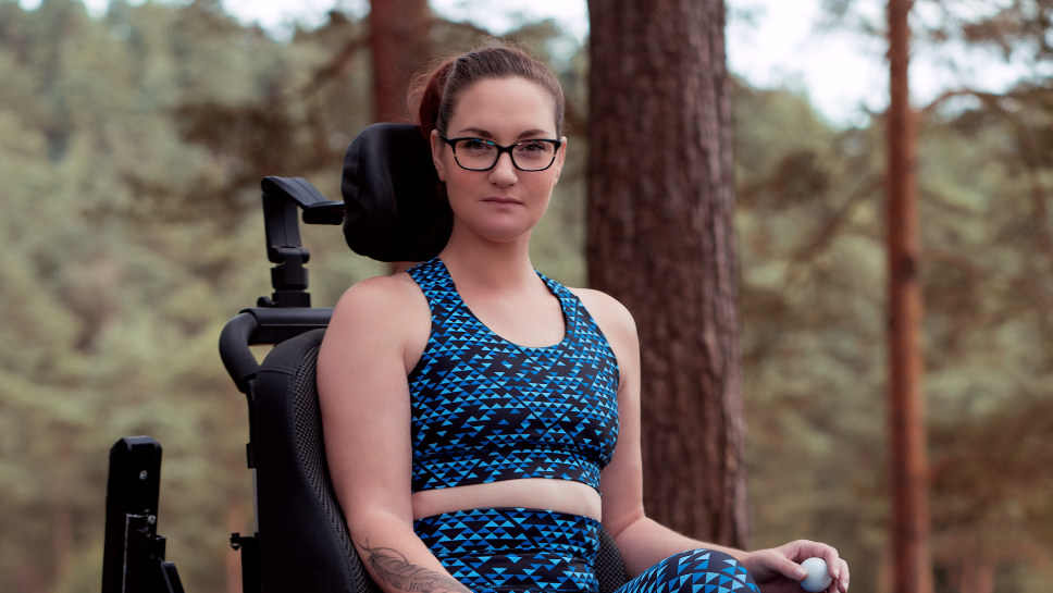 a determined looking women poses for the camera