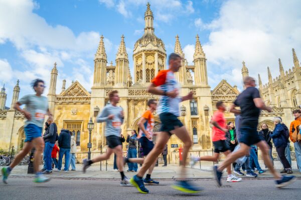 A group of runners move through Cambridge during the Bidwells Cambridge 10k