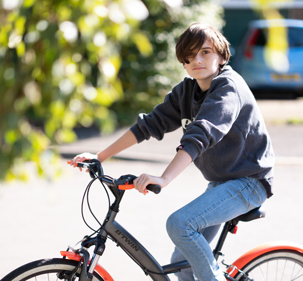 Luca riding his bike