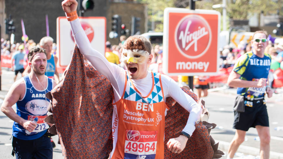 A runner at the London Marathon in 2018 dressed up in a superhero costume