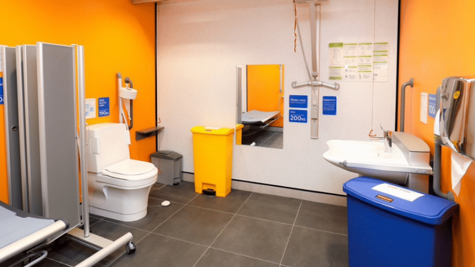 Changing Places toilet with orange walls