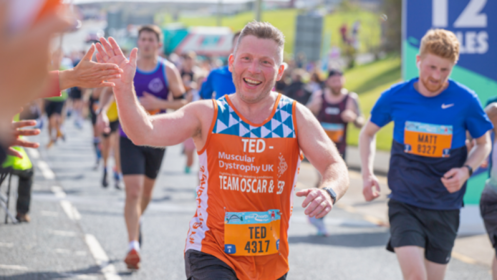 Team Orange runner at the Great North Run 2023