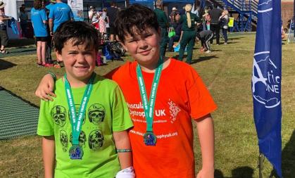William and Thomas with medals