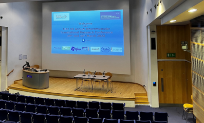 Image of an auditorium with a projection of a presentation that reads 'Welcome to the 16th UK Annual Neuromuscular Translational Research Conference 29th and 30th March 2023'