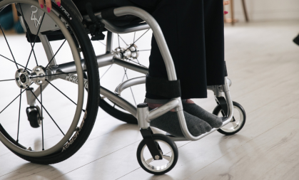 Close up image of a self propelled wheelchair