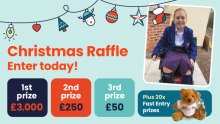 Amelie sits in her wheelchair. The graphic reads "Christmas Raffle Enter today! 1st prize £3,000. 2nd prize £250. 3rd prize £50. Plus 20x fast entry prizes."